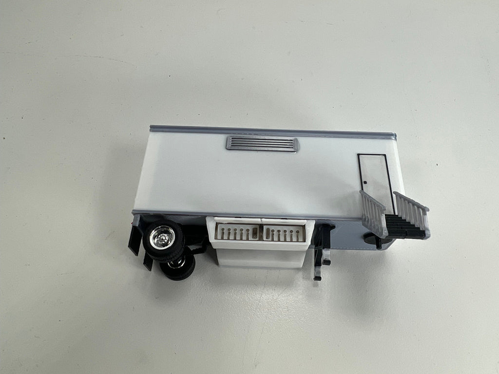 HO Scale PUP Trailer Office/Generator for model trains carnival. With open bottom door.