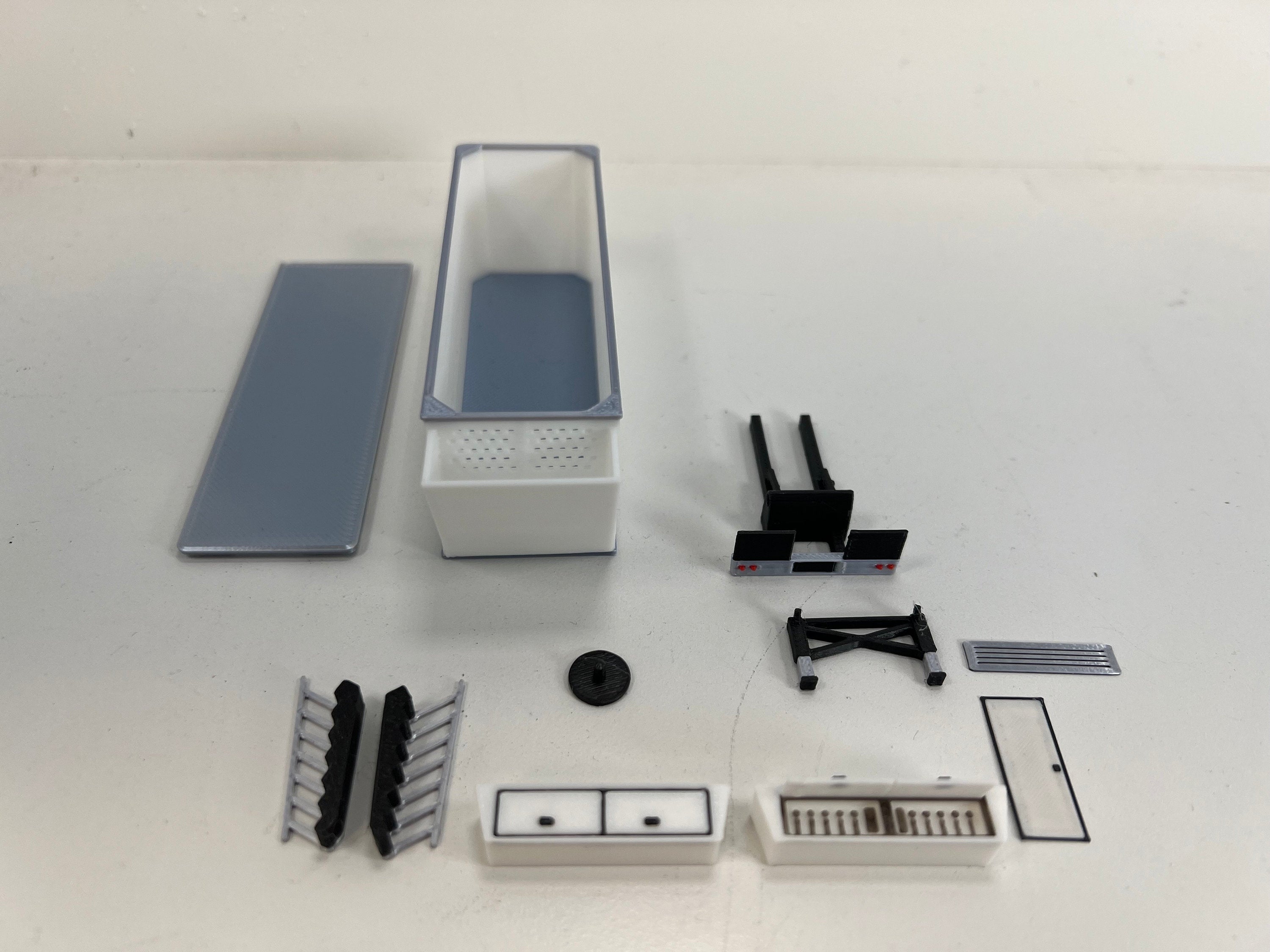 HO Scale PUP Trailer Office/Generator for model trains carnival. With open bottom door and back exhaust.