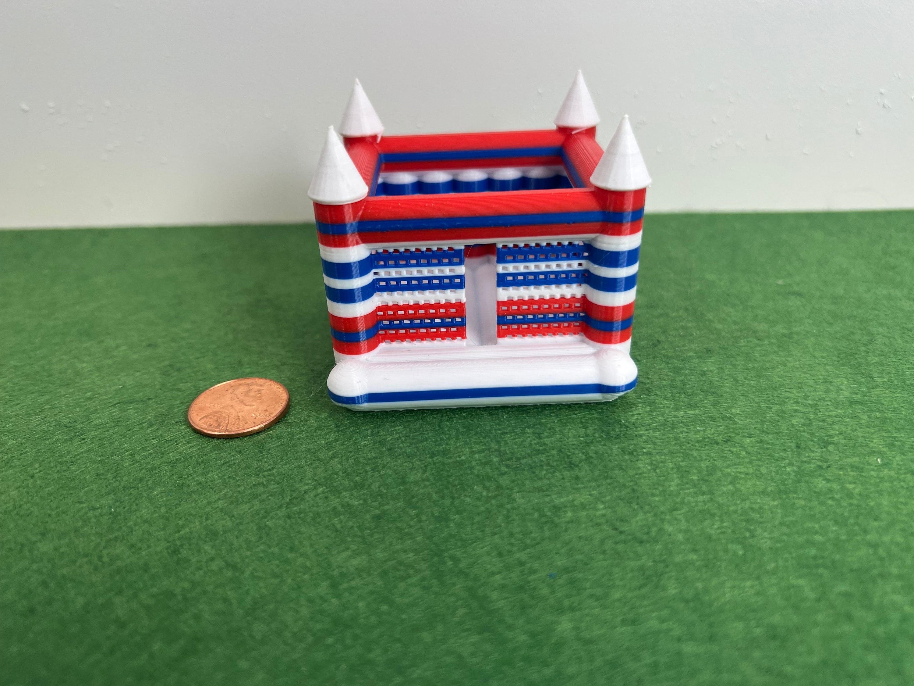 HO Scale muti-colored bounce house.