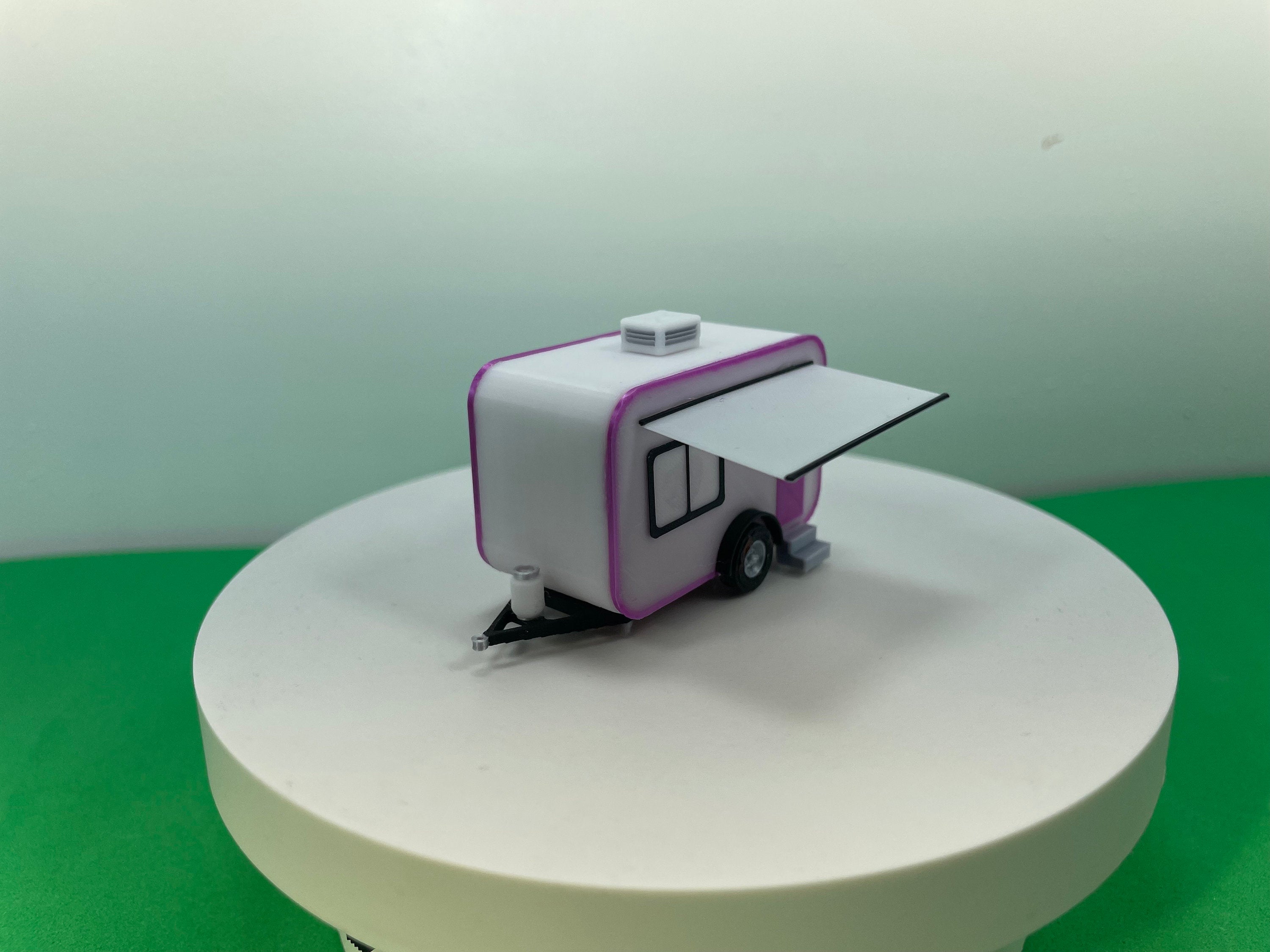 HO Scale Camper Trailer Kit in color.