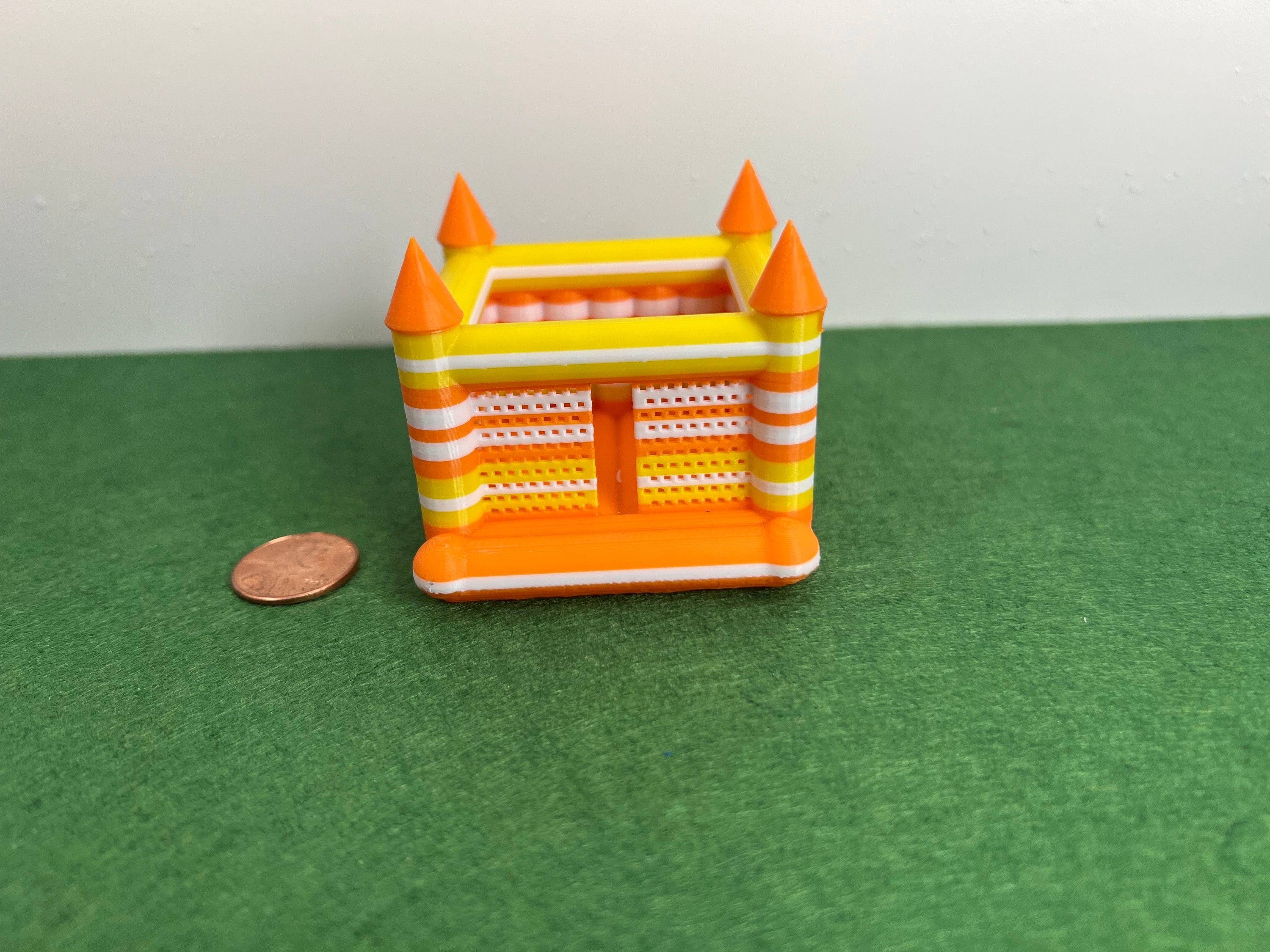 HO Scale muti-colored bounce house.