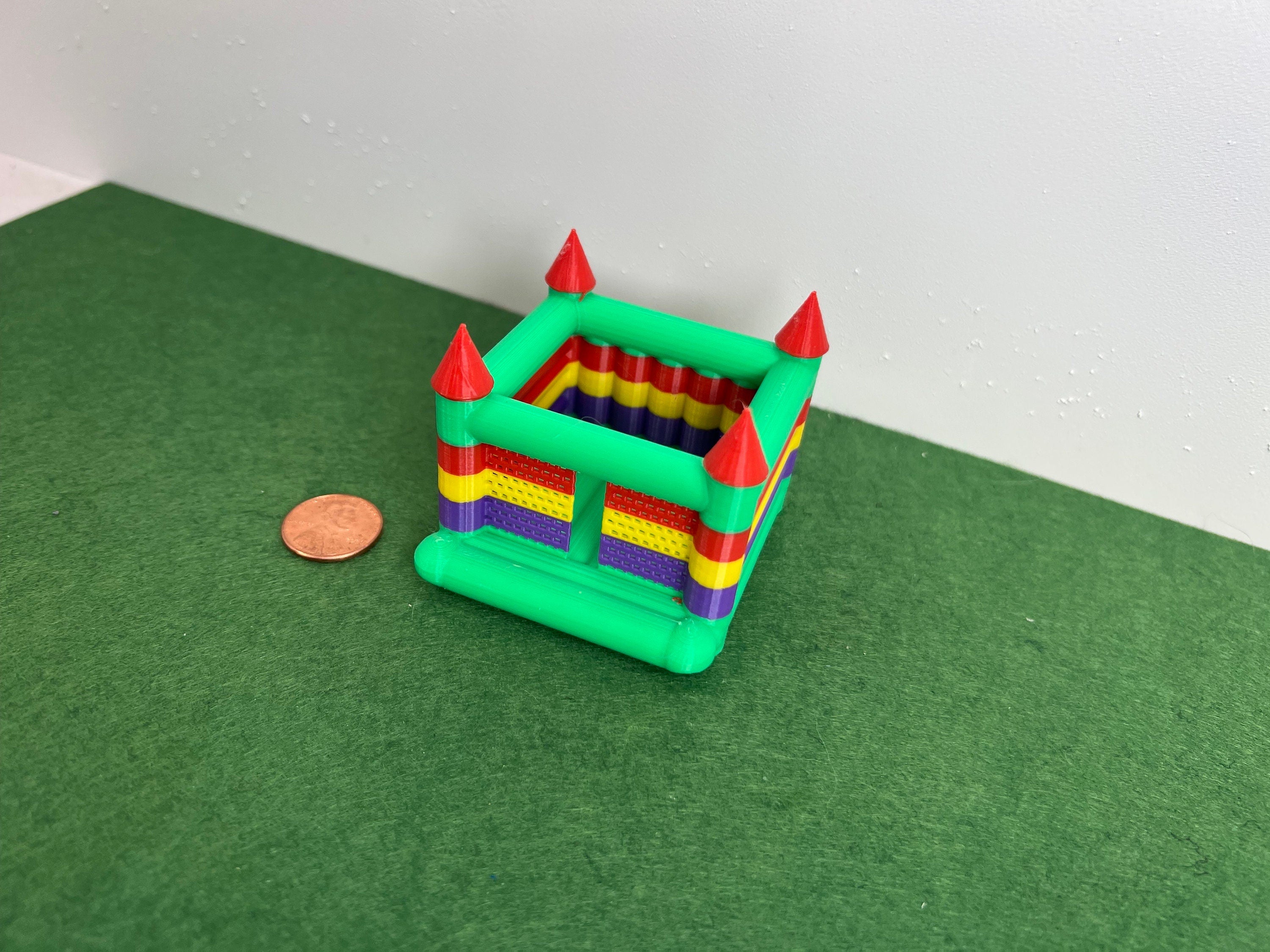 HO Scale muti-colored bounce house.