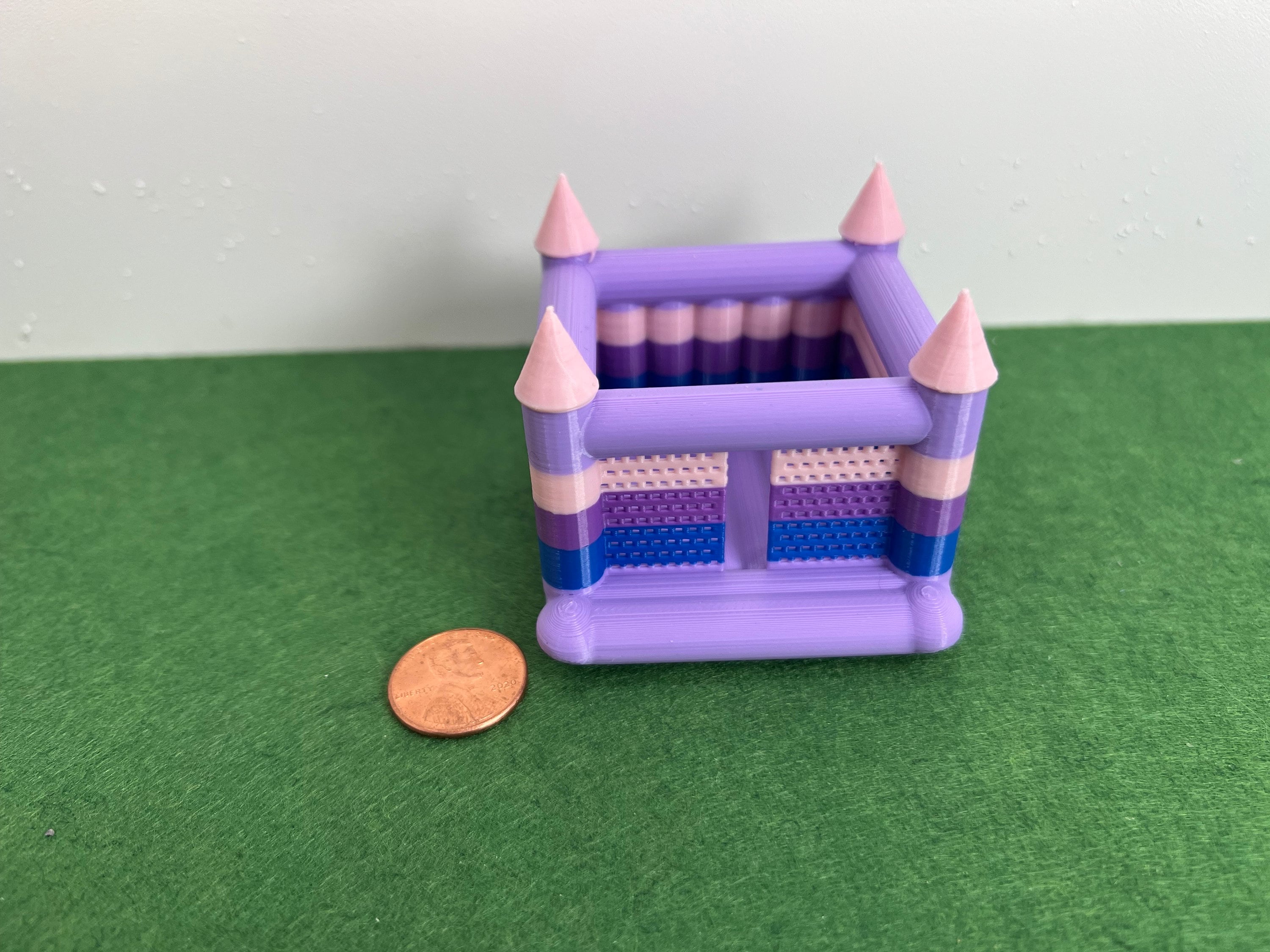 HO Scale muti-colored bounce house.