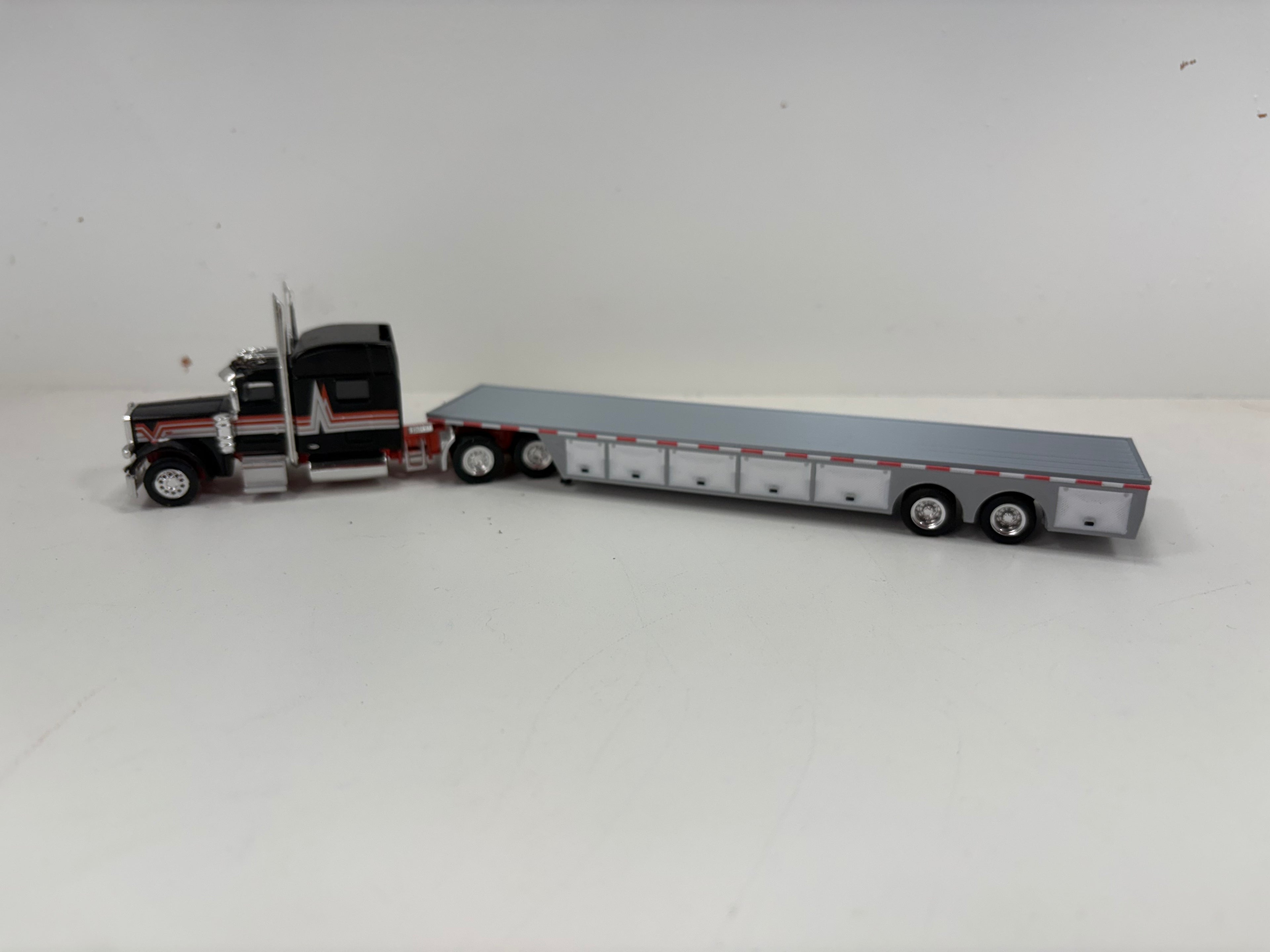HO Scale Flat Bed Trailer with underneath storage.