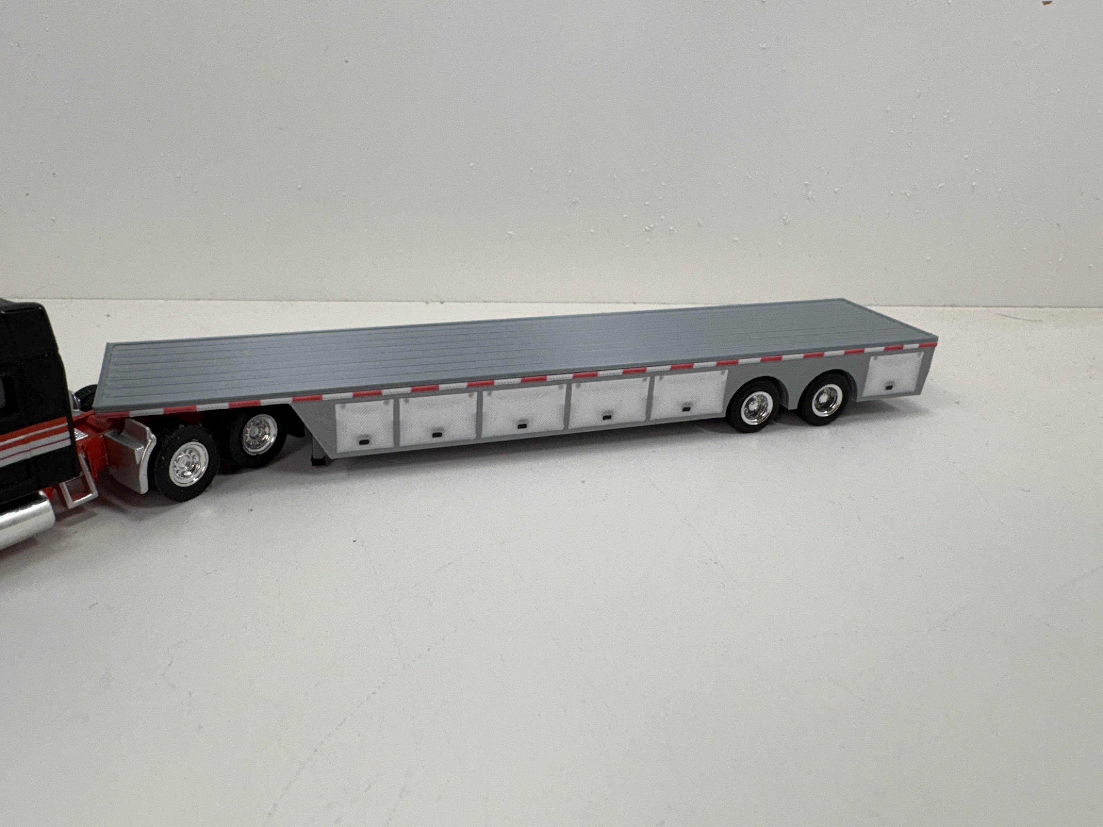 HO Scale Flat Bed Trailer with underneath storage.