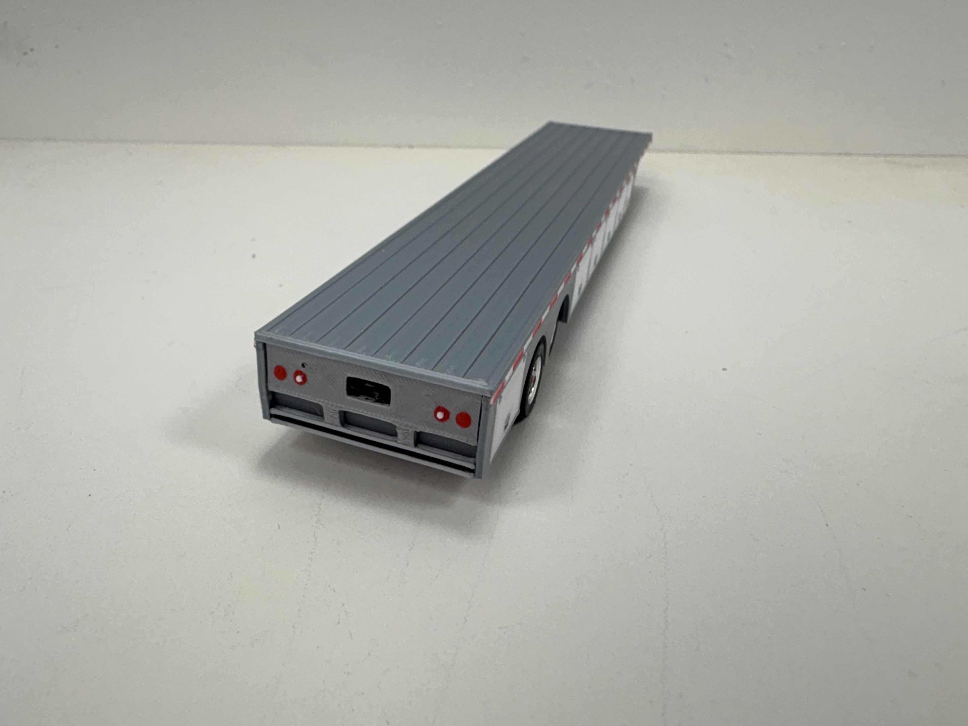 HO Scale Flat Bed Trailer with underneath storage.