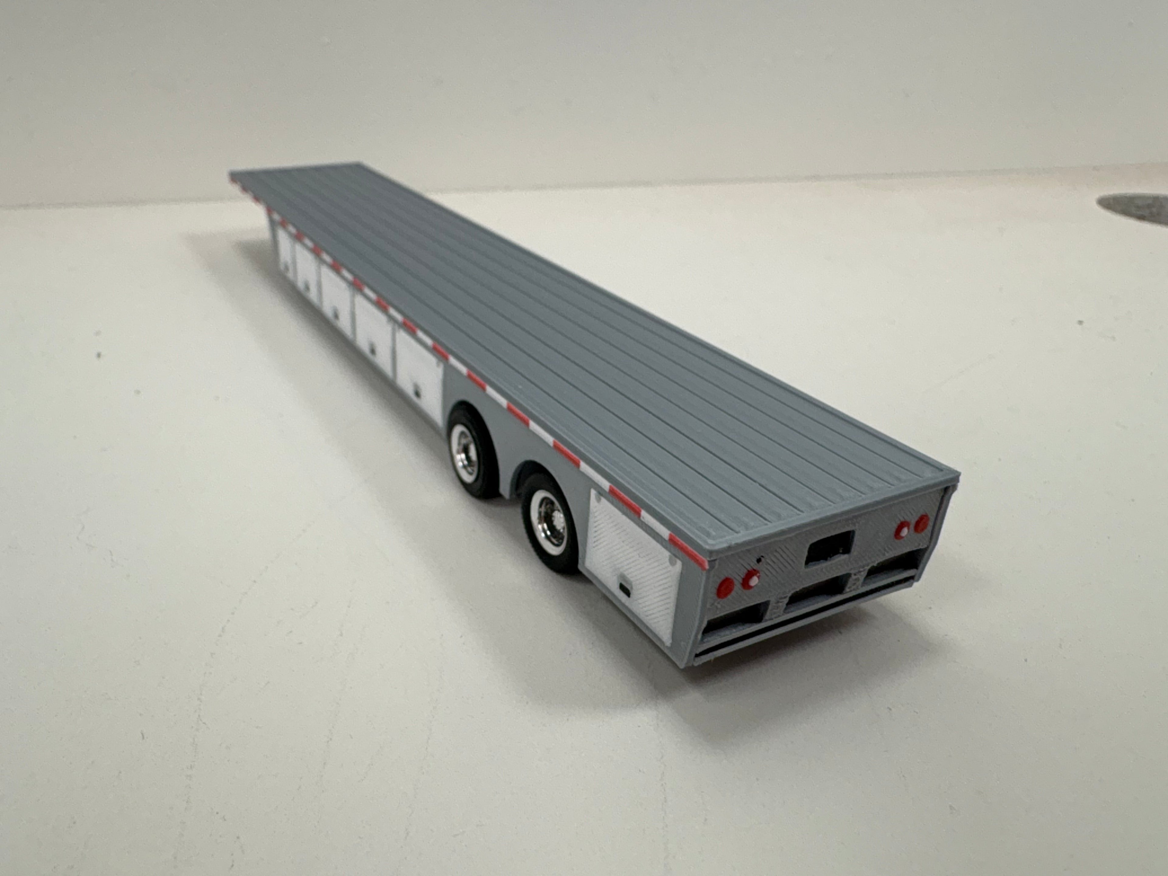 HO Scale Flat Bed Trailer with underneath storage.