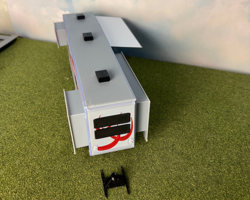 1/48 Scale 5th Wheel Camper Trailer (gray with red in color)