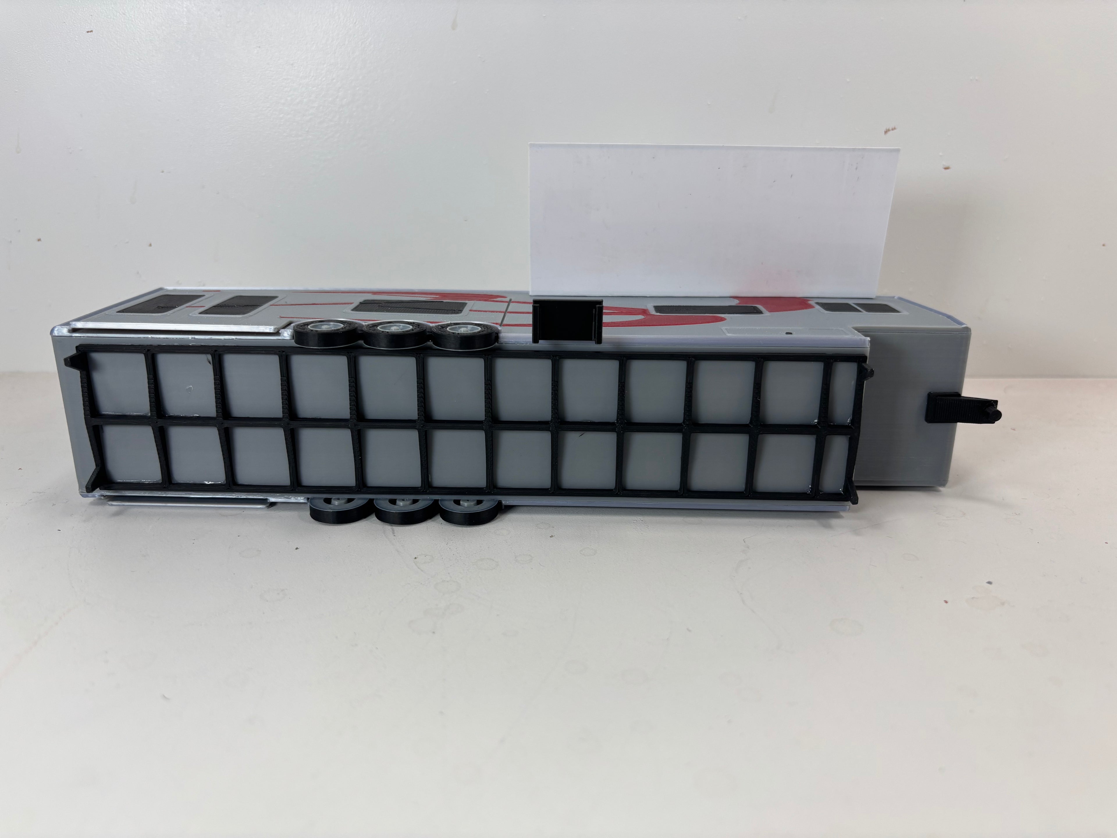 1/48 Scale 5th Wheel Camper Trailer (gray with red in color)