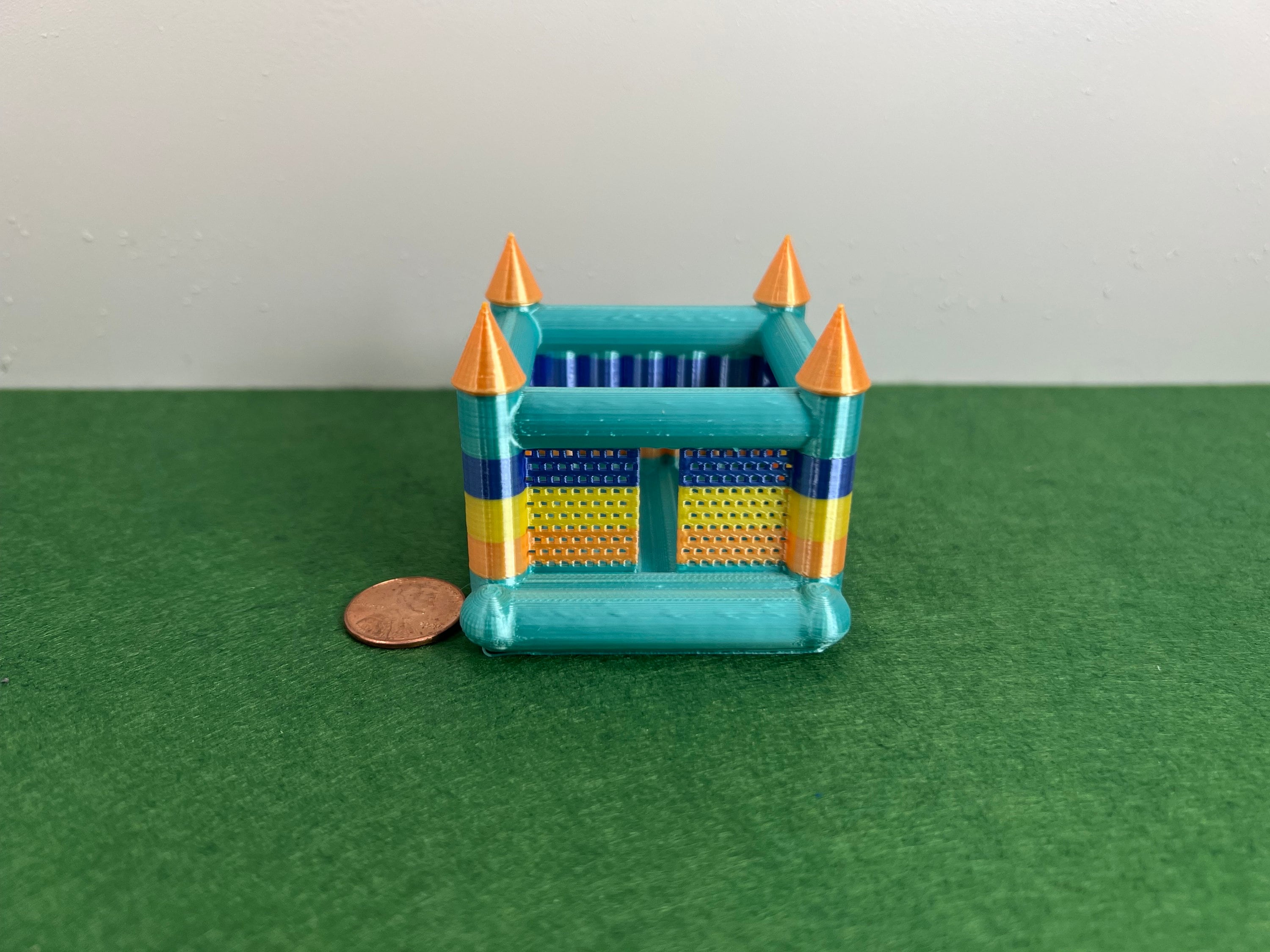 HO Scale muti-colored bounce house.
