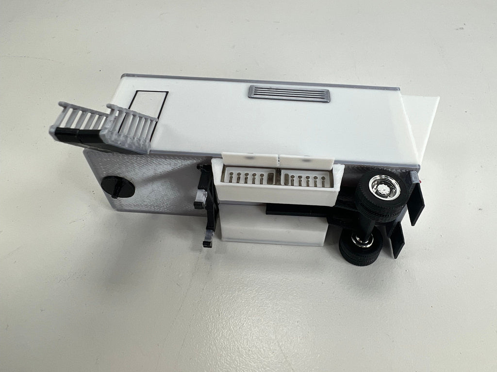 HO Scale PUP Trailer Office/Generator for model trains carnival. With open bottom door and back exhaust.