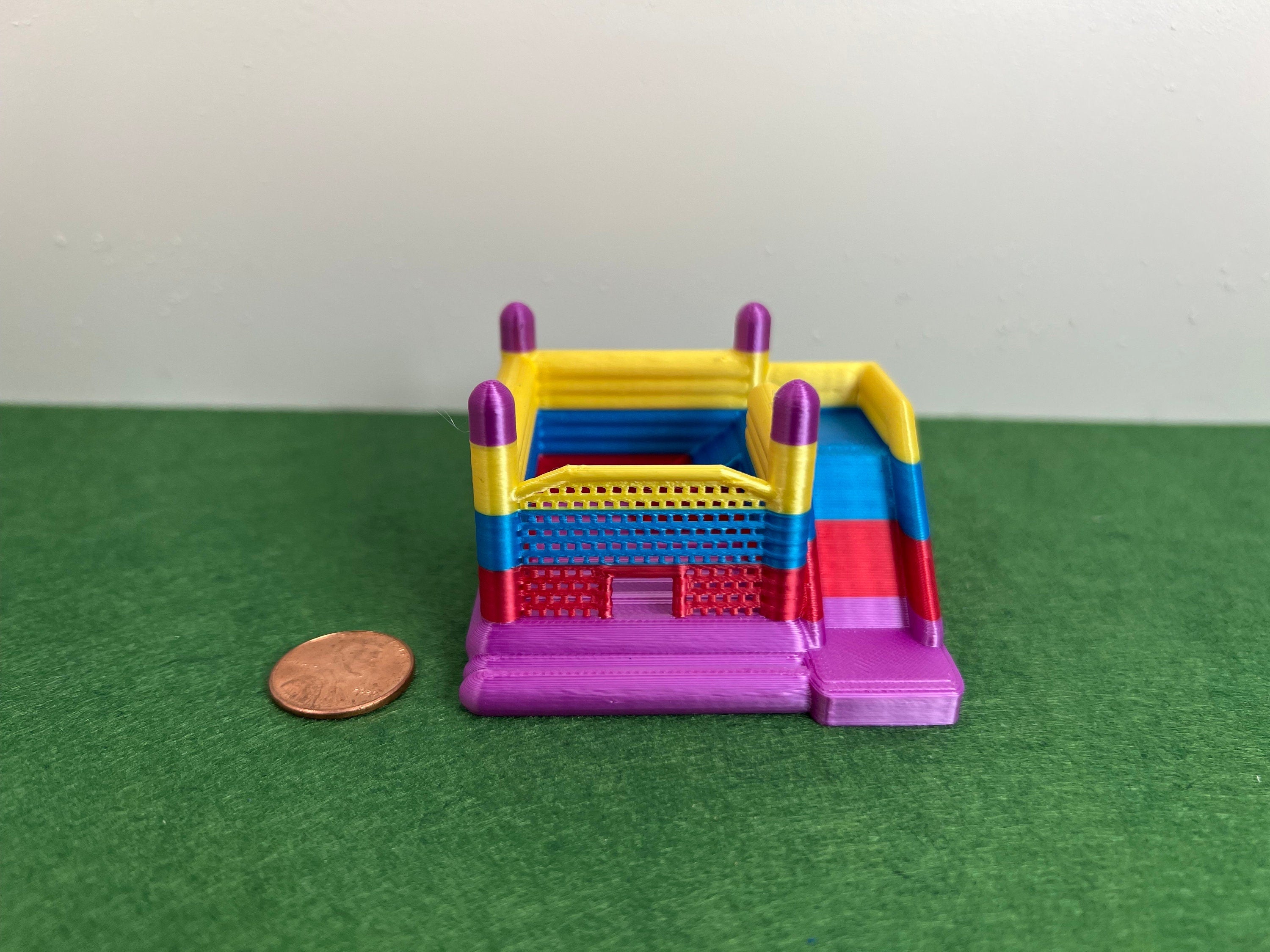 HO Scale muti-colored bounce house.